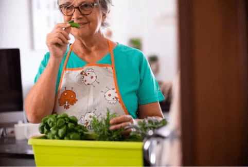 Elderly woman gardening