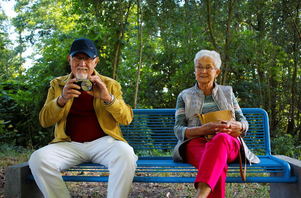 Elderly People sitting on a bench